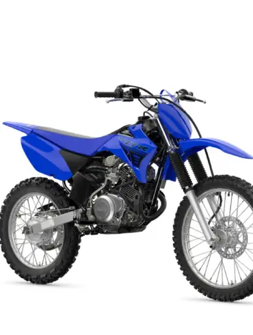 Yamaha TT-R125 Motocross-Motorrad in blauer Farbe mit Stollenreifen, Seitenansicht, freigestellt auf weißem Hintergrund.