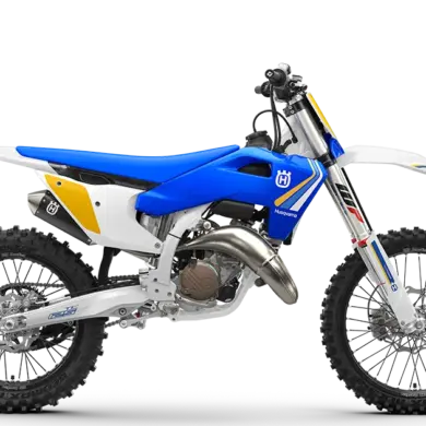 Motocross-Motorrad Husqvarna TC 125 Heritage 2025 mit blau-gelbem Design, Seitenansicht.