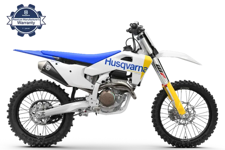 Motocross-Motorrad Husqvarna FC 250 2027 in Seitenansicht mit blauem Sitz und Premium Herstellergarantie-Emblem.