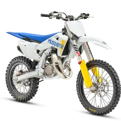 Motocross-Motorrad Husqvarna TC 85 17/14 in Seitenansicht vor weißem Hintergrund