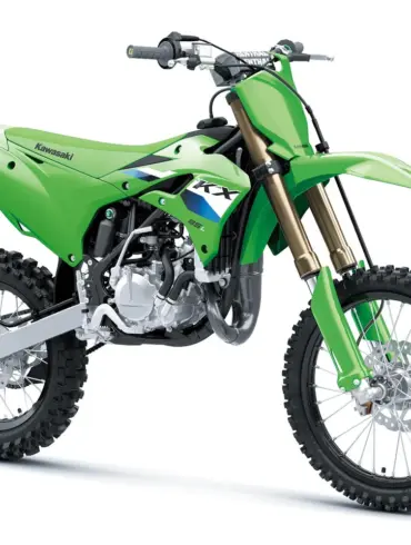 Kawasaki KX85 L 2027 in Seitenansicht, grünes Motocross-Bike mit großem Vorderrad und Hinterrad.