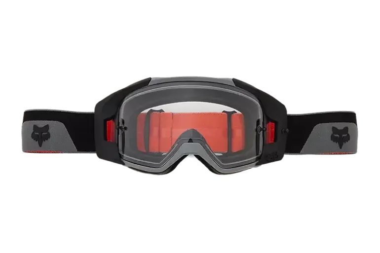 Vue X Crossbrille von Fox Racing mit klarer Doppelsichtscheibe, schwarzem Rahmen und grauem Riemen mit Fox-Logo.