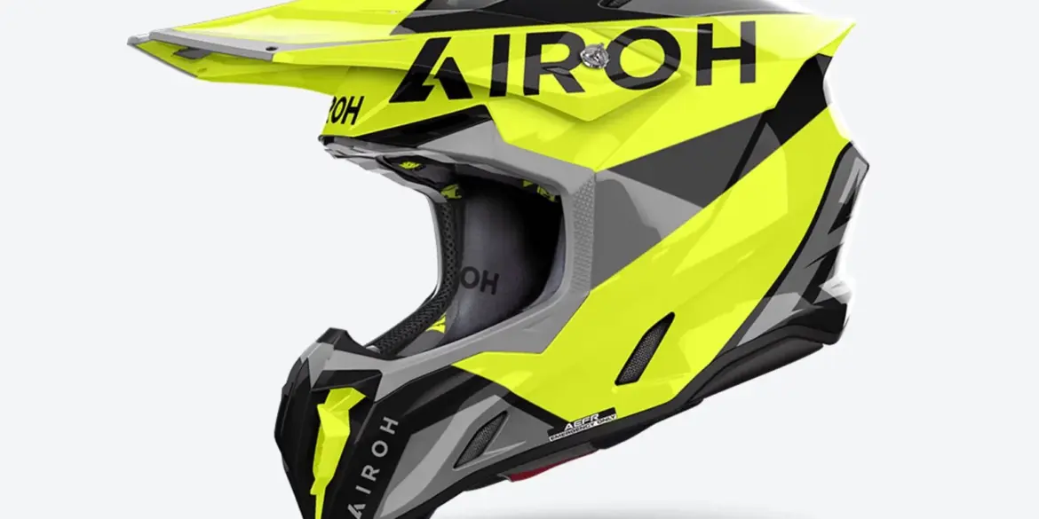 Airoh Twist 3 King Helm in Gelb Glanz mit markantem, aggressivem Design, seitliche Ansicht.