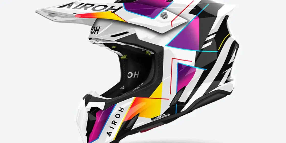 Airoh TWIST 3 RAINBOW Offroad-Helm mit buntem, geometrischem Design in Weiß, Schwarz, Gelb, Lila und Rot, Seitenansicht.