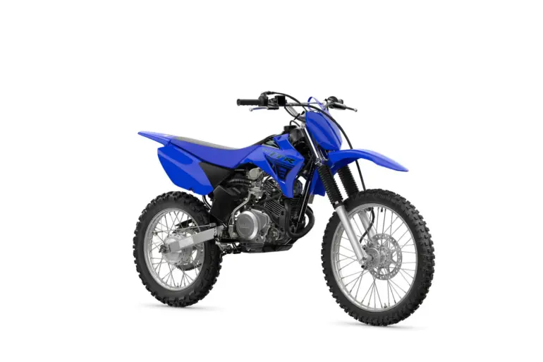 Yamaha TT-R125 Motocross-Motorrad in blauer Farbe mit Stollenreifen, Seitenansicht, freigestellt auf weißem Hintergrund.