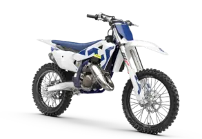 Husqvarna TC 125 2026 Motocross-Motorrad in seitlicher Ansicht, weiß-blaues Design, stehende Präsentation vor neutralem Hintergrund