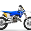 Motocross-Motorrad Husqvarna TC 125 Heritage 2025 mit blau-gelbem Design, Seitenansicht.