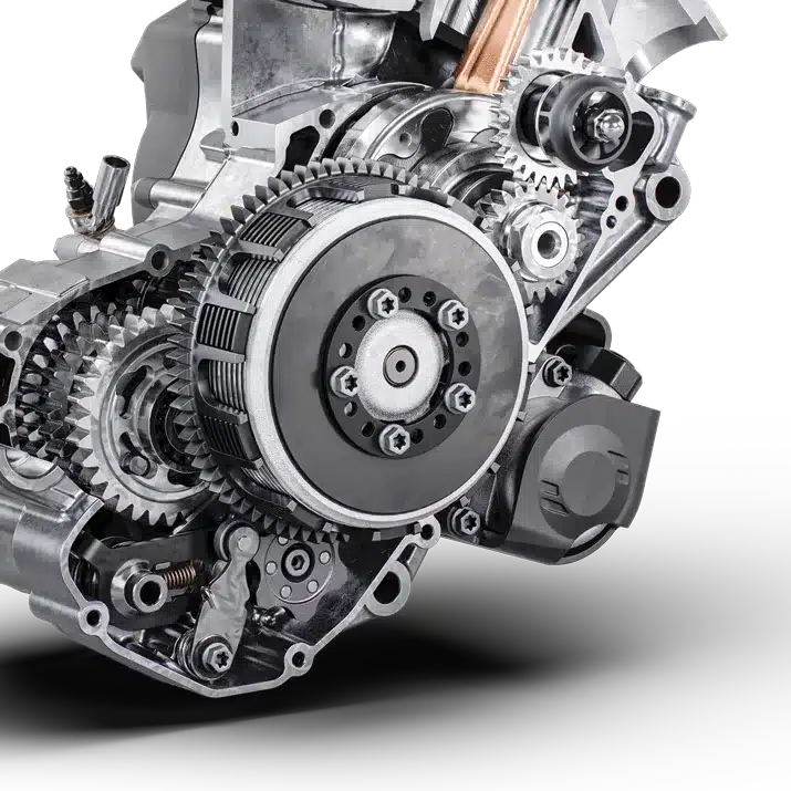 Detailaufnahme des Husqvarna TC 125 Heritage 2-Takt-Motors mit Kupplung und Zahnrädern