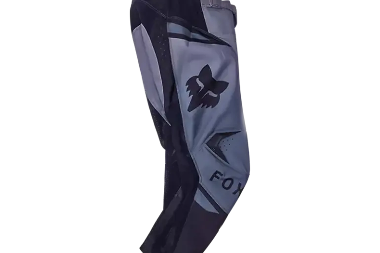 Schwarze Fox 180 Shield Kinder-Motocross-Hose mit sichtbarem Fox-Kopf-Logo in der Seitenansicht