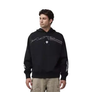 Mann trägt den Fox Racing Kapuzenpullover Energy Face Oversized in Schwarz mit weißer Grafik und Kängurutasche.