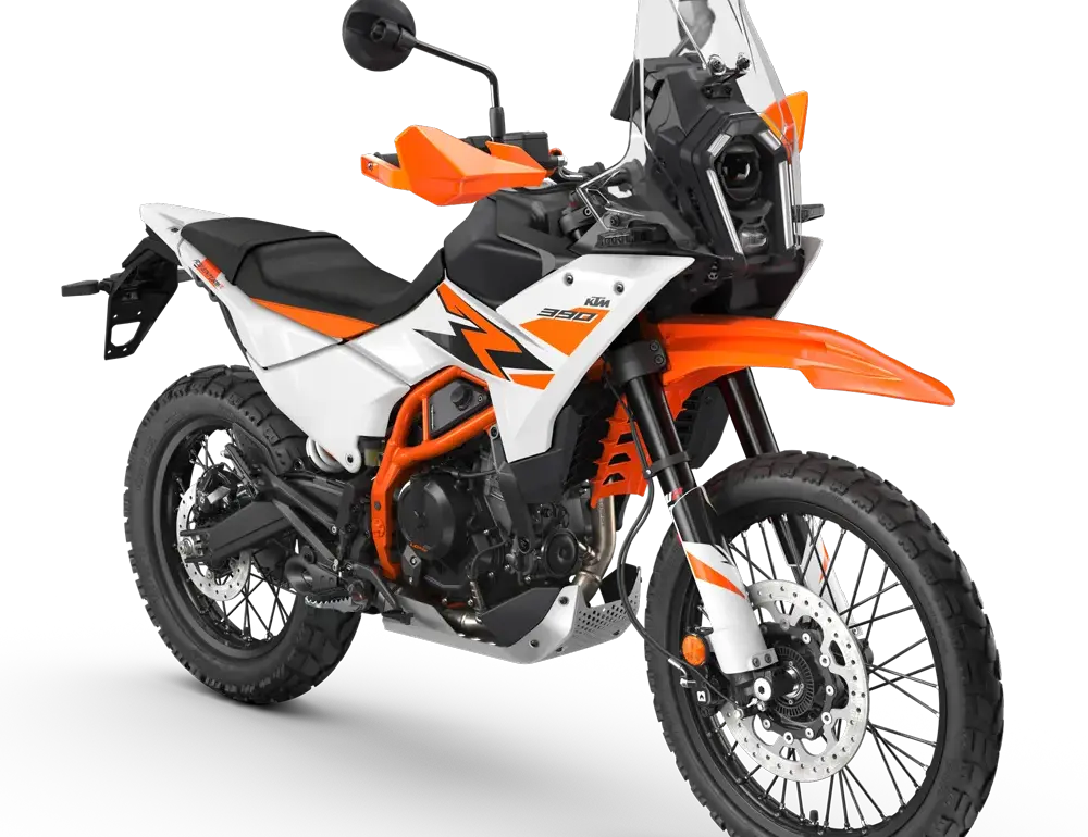 KTM 390 Adventure R 2026 in Orange und Weiß, Seitenansicht vor weißem Hintergrund