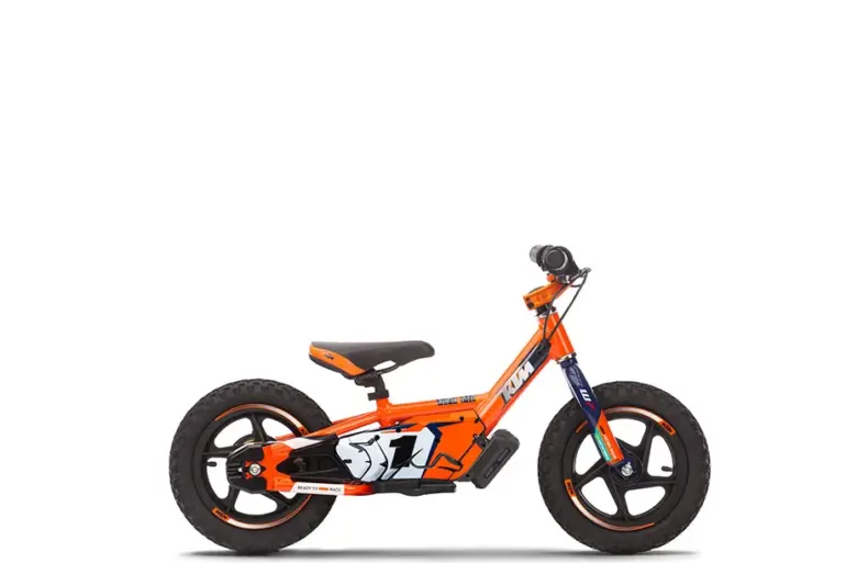 KTM SX-E 1.12 Elektro-Laufrad in Orange im Profil, speziell für Kinder