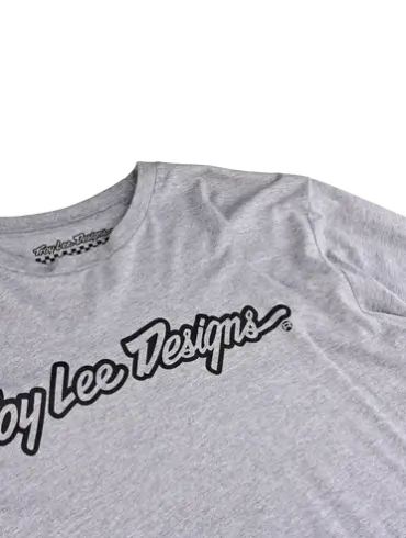 Graumeliertes Langarm-T-Shirt von Troy Lee Designs mit schwarzem Logo-Schriftzug auf der Brust.