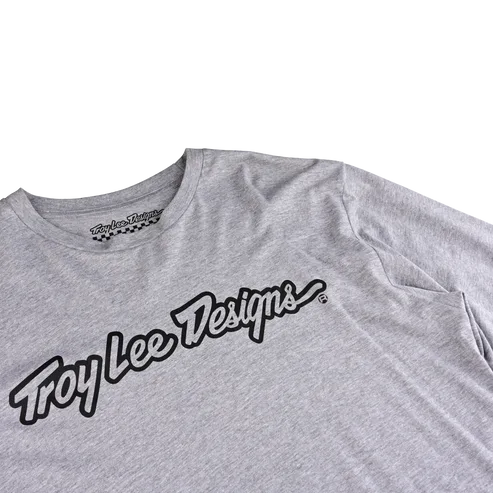 Graumeliertes Langarm-T-Shirt von Troy Lee Designs mit schwarzem Logo-Schriftzug auf der Brust.
