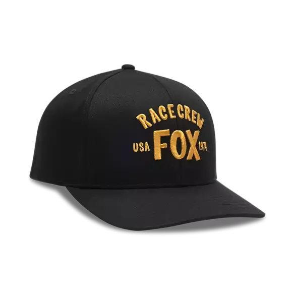 Schwarzes Fox Racing Snapback Cap mit gelber 'RACE CREW FOX USA 1974' Stickerei auf der Frontansicht.