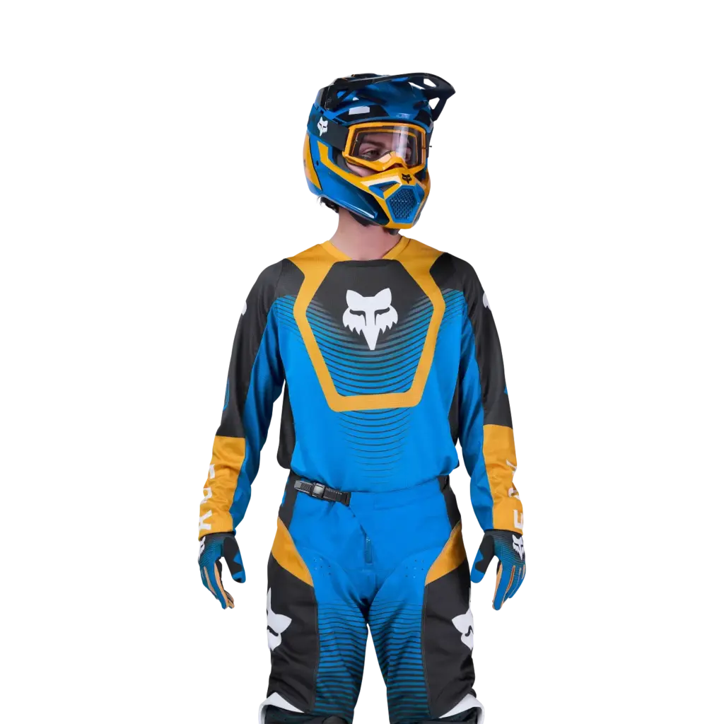 Motocross-Fahrer trägt das blaue 180 Collect Jersey mit Helm und kompletter Ausrüstung