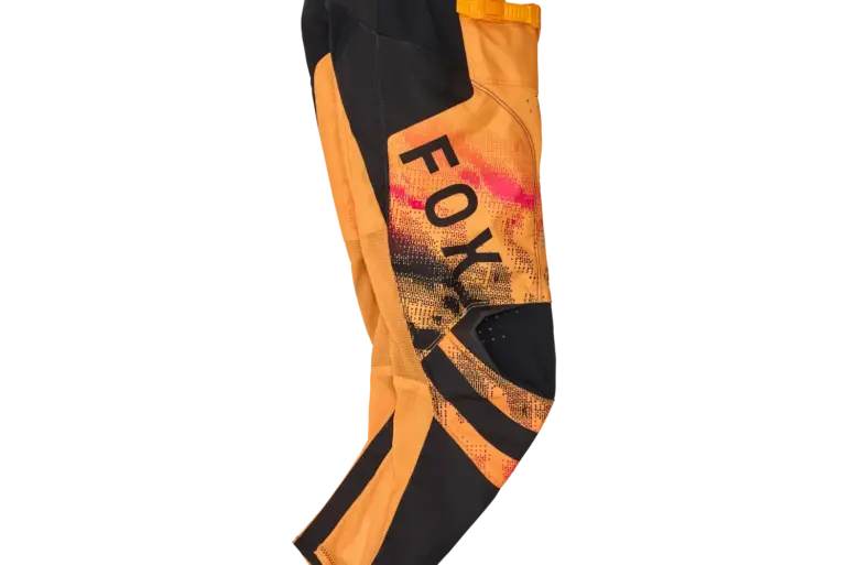 Motocross-Hose FOX 180 Kairos in Orange und Schwarz für Jugendliche, seitlich abgebildet