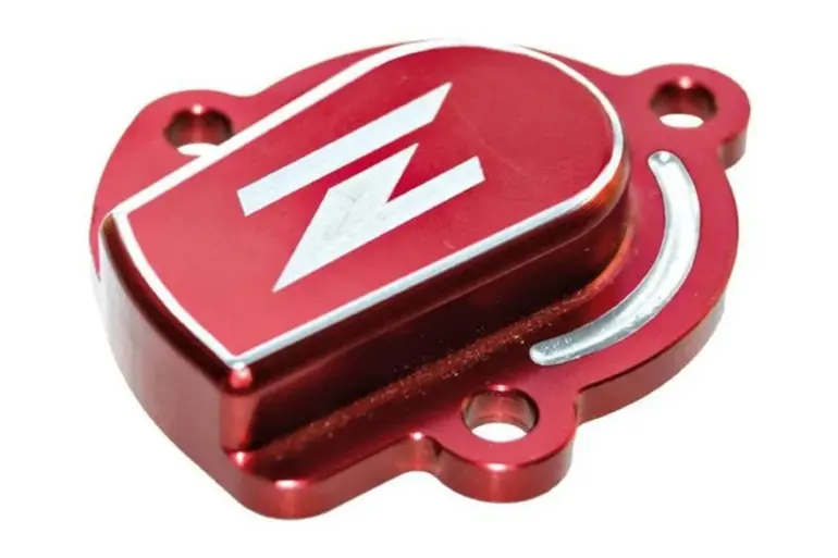 Roter Beschleunigerpumpen-Deckel als Zubehörteil für den Vergaserbereich eines Motorrads