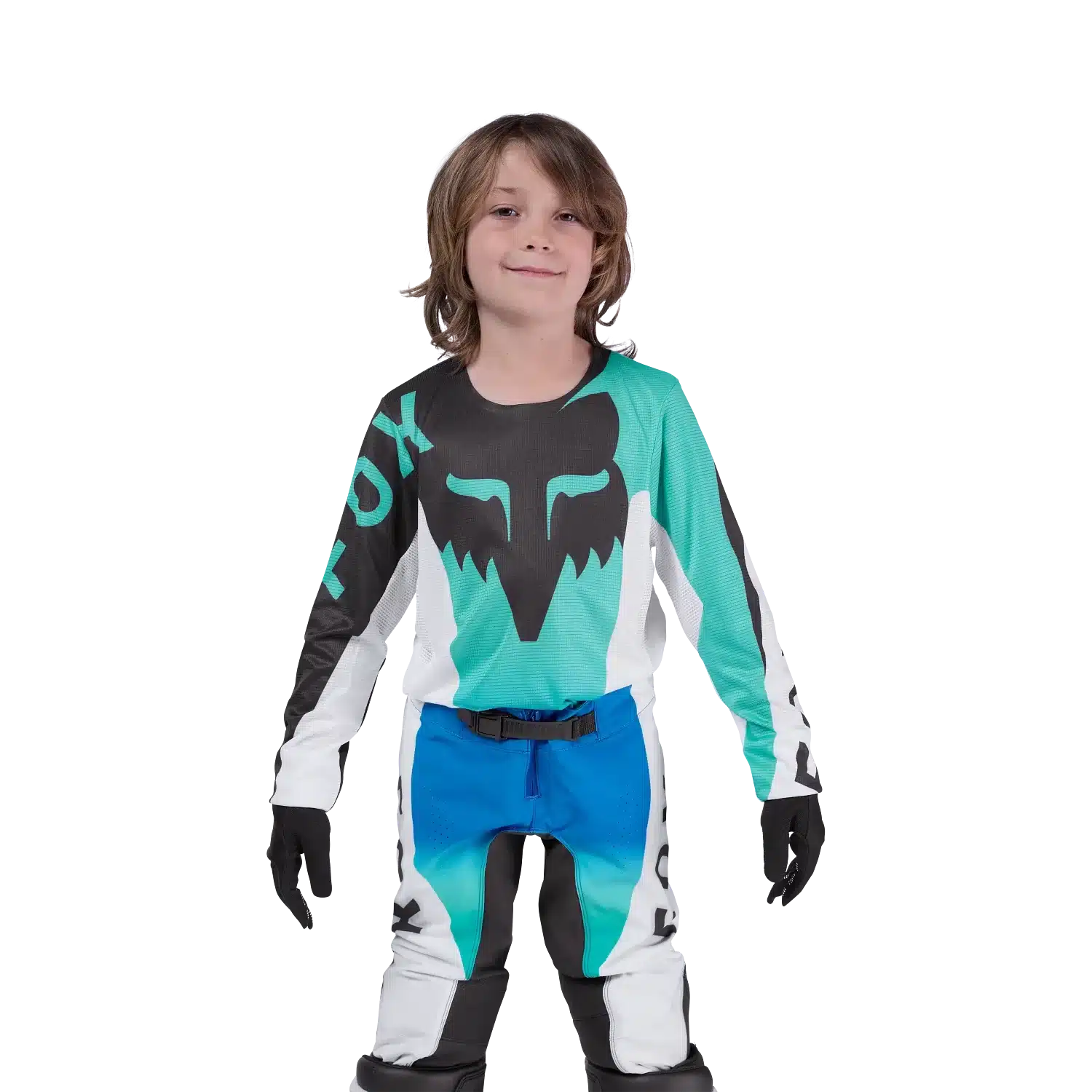 Junge trägt das Flexair Spire Jersey von Fox Racing in türkis, schwarz und weiß mit großem Fox-Head-Logo.