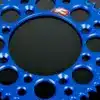 Blaues, leichtes Renthal-Kettenrad aus Aluminium mit Gewichtserleichterungsbohrungen und Mud-Groove-Design.