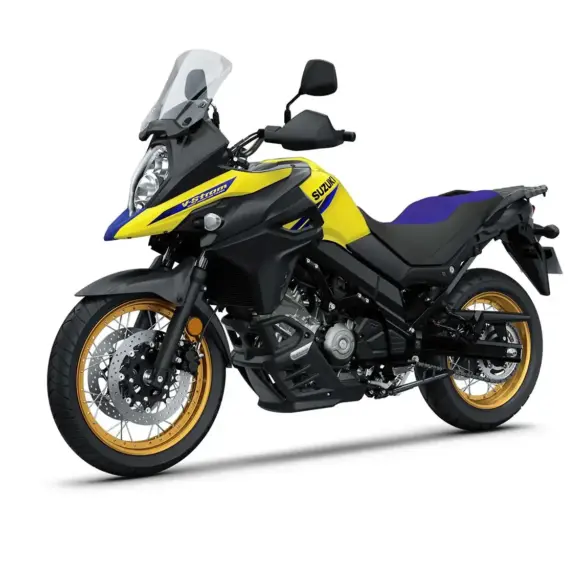 Suzuki V-Strom 650XT Touring Edition Motorrad in Gelb-Schwarz mit goldenen Felgen, seitlich fotografiert.