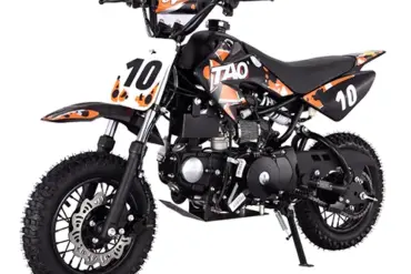 Tao Motor DB10 Mini-Dirtbike für Kinder, schwarz-orange mit Startnummer 10, Seitenansicht.