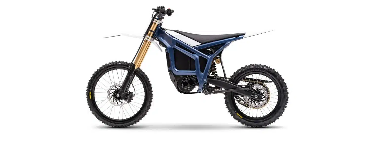 Elektrisches Offroad-Motorrad Talaria Komodo MX6 mit sportlichem Rahmen und Stollenreifen, Seitenansicht.