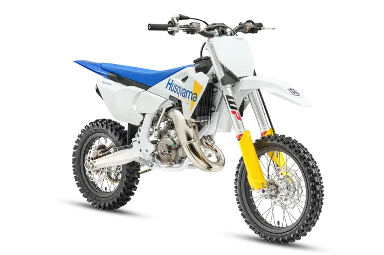 Husqvarna TC 65 2027 Kinder-Motocross-Motorrad in weiß-blau-gelb mit Stollenreifen, Seitenansicht
