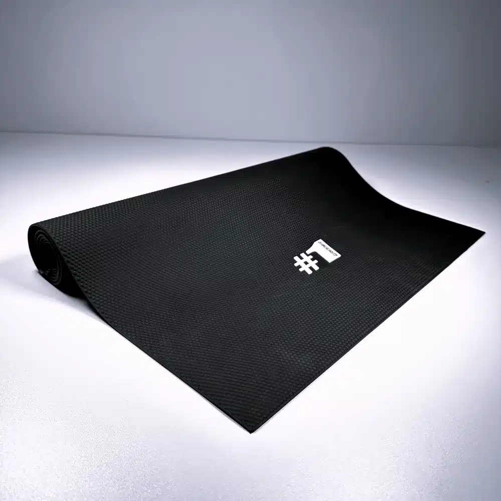 Ausgerollter ONEGRIPPER HEX XXL Sitzbankbezug mit HEX-Muster und weißem Logo auf hellem Hintergrund.
