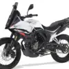 Rieju Aventura 125 Motorrad in Seitenansicht, weiß-schwarzes Design mit grobstolligen Reifen.