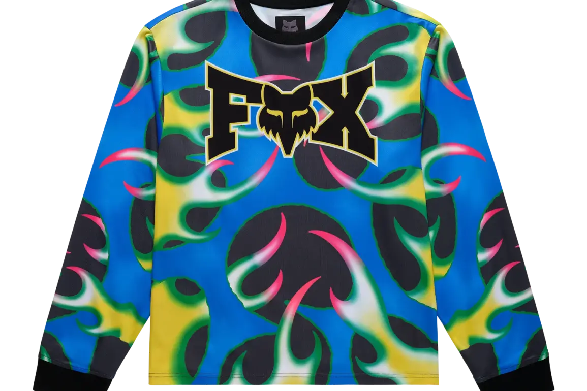 Fox Lab Quasi Flame Trikot mit vorne großem FOX-Logo und buntem Allover-Flammenmuster
