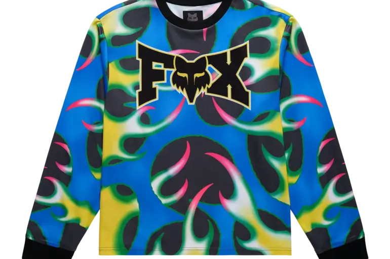 Fox Lab Quasi Flame Trikot mit vorne großem FOX-Logo und buntem Allover-Flammenmuster