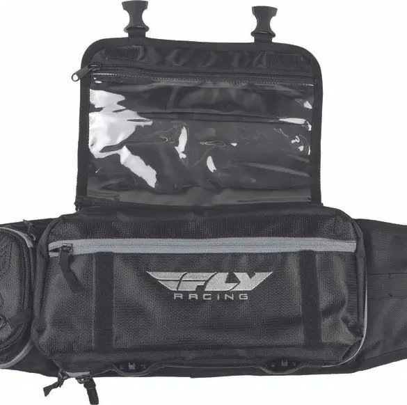 Geöffnetes FLY Racing Tool Pack mit mehreren Fächern und transparenter Tasche.