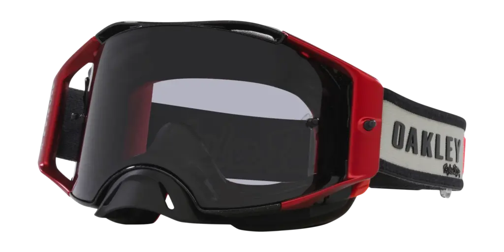 Oakley Airbrake MX Motocross-Brille mit rotem Rahmen, dunklem Glas und OAKLEY-Schriftzug auf dem Band