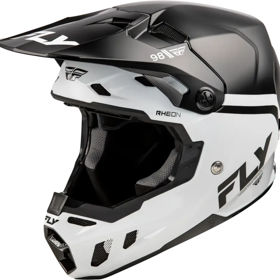 Schwarz-weißer Formula CC Objective Helm von FLY Racing in Seitenansicht mit Belüftungsöffnungen und Visier.
