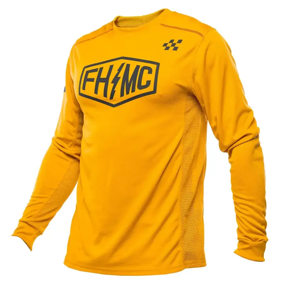 Gelbes Sanguaro Bennet Jersey mit Mesh-Vent-Einsätzen und FHMC-Logo auf der Brust.
