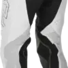 Weiße Motocross-Hose Evolution DST LE Flash Pants mit schwarzen und silbernen Akzenten, Vorderansicht.