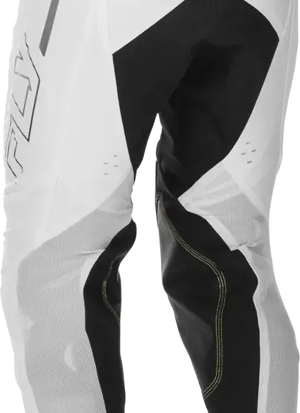 Weiße Motocross-Hose Evolution DST LE Flash Pants mit schwarzen und silbernen Akzenten, Vorderansicht.