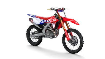 Honda CRF450R Motocross-Bike in Seitenansicht mit Werksgrafiken.