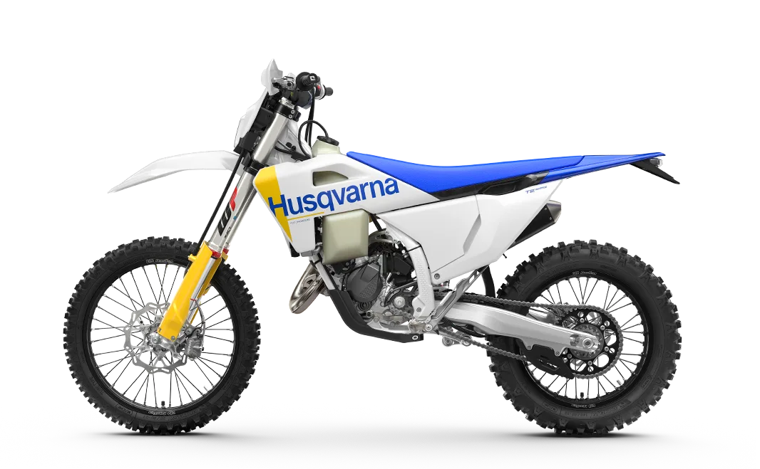 Husqvarna TE 125 Sportenduro-Motorrad in Seitenansicht mit blauem Sitz und weiß-gelbem Design