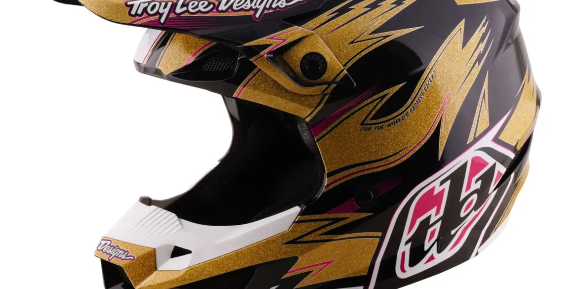 Motocross-Helm Troy Lee Designs in Gold-Schwarz mit integriertem Kinnbügel und Visier