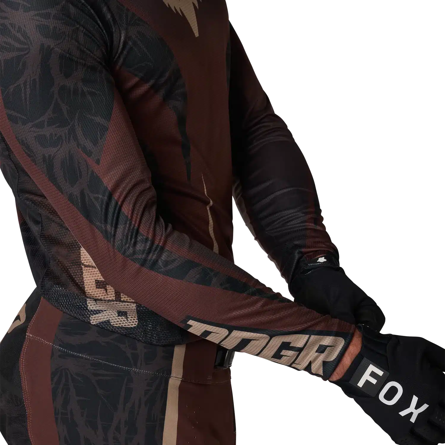 Armansicht eines sportlichen Flexair HD38 Trikots mit auffälligem Design und Fox-Handschuhen