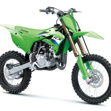 Kawasaki KX85 L 2027 in Seitenansicht, grünes Motocross-Bike mit großem Vorderrad und Hinterrad.