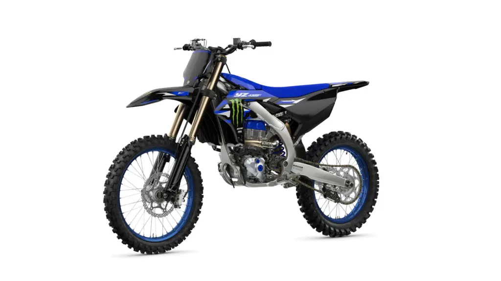 Yamaha YZ450F Monster Energy Yamaha Racing Edition in Seitenansicht, Motocross-Motorrad in Schwarz-Blau mit Monster Energy Design.