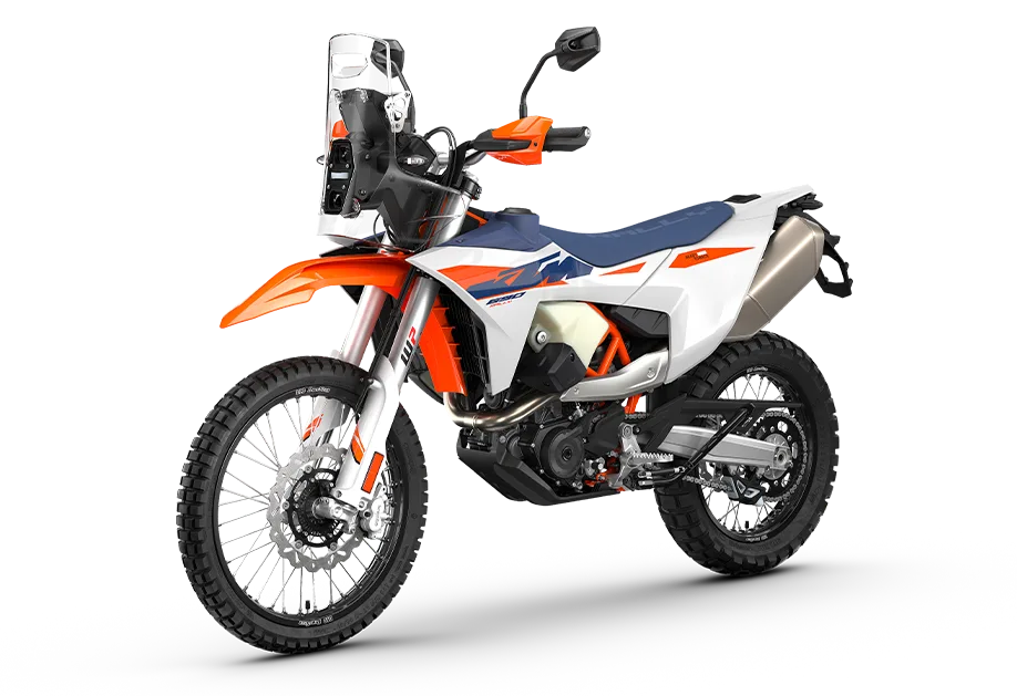 KTM 690 RALLY Motorrad in Seitenansicht, orange-weiß-blau lackiert, mit Rally Tower und umfangreicher Offroad-Ausstattung.